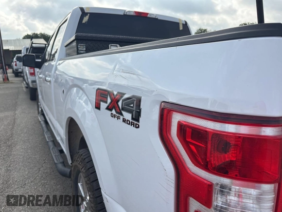 2019 Ford F-150 XL with VIN 1FTFW1E42KKF27037, listed as a IAAI auction lot 42777832 with 169,179 mi miles and . Bid and sale history available at DreamBid. Image 9.
