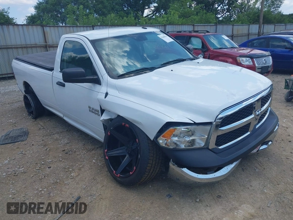 2014 Ram 1500 Tradesman with VIN 3C6JR6DT4EG186606, listed as a IAAI auction lot 42640415 with 113,110 mi miles and . Bid and sale history available at DreamBid. Image 1.