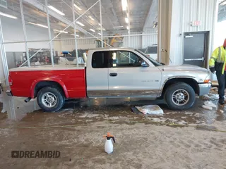 1998 Dodge Dakota SLT z VIN 1B7GL22YXWS762222, wystawiony jako IAAI lot #41250956 z przebiegiem 195 027 mil mil oraz . Historia ofert i sprzedaży dostępna na DreamBid. Obrazek 13.