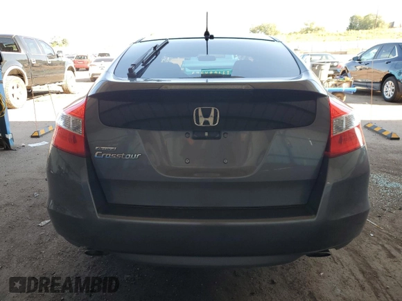 2011 Honda Crosstour EX z VIN 5J6TF1H32BL002733, wystawiony jako Copart lot #70150324 z przebiegiem Nie podano mil oraz Szkoda całkowita • Salvage title. Historia ofert i sprzedaży dostępna na DreamBid. Obrazek 6.