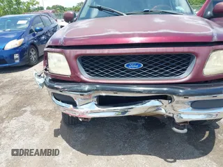 1998 Ford F-150 XL with VIN 2FTRX08L8WCA36361, listed as a IAAI auction lot 42617079 with 263,666 mi miles and . Bid and sale history available at DreamBid. Image 6.