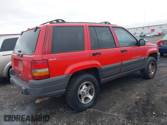 1996 Jeep Grand Cherokee Laredo with VIN 1J4GZ58Y3TC350926, listed as a IAAI auction lot 41224374 with 266,833 mi miles. Bid and sale history available at carsss.com. Image 4.