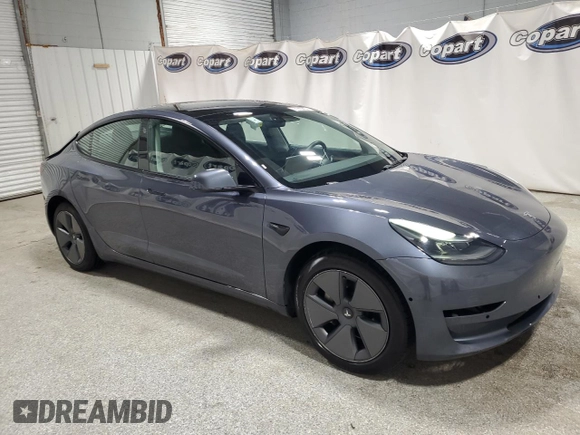 2022 Tesla Model 3 with VIN 5YJ3E1EA8NF287506, listed as a Copart auction lot 55674145 with 106,745 mi miles and Clean Title. Bid and sale history available at DreamBid. Image 4.
