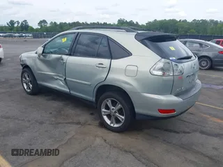 2006 Lexus RX 400h with VIN JTJHW31U462004373, listed as a IAAI auction lot 42081583 with 294,827 mi miles and . Bid and sale history available at DreamBid. Image 3.