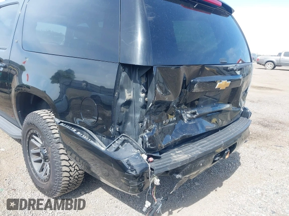 2012 Chevrolet Suburban LT with VIN 1GNSKJE72CR314366, listed as a IAAI auction lot 42453057 with 183,897 mi miles and . Bid and sale history available at DreamBid. Image 6.
