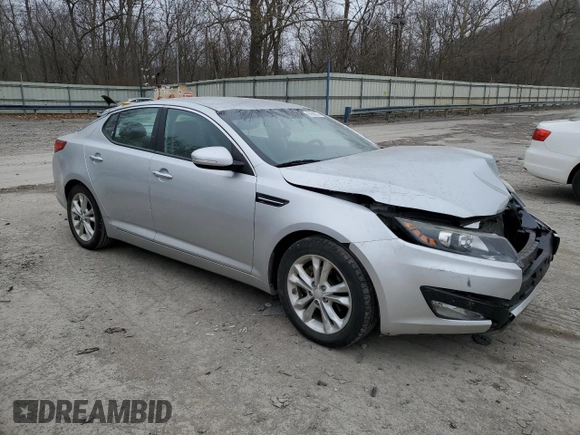 2013 Kia Optima EX z VIN 5XXGN4A7XDG144632, wystawiony jako Copart lot #83599614 z przebiegiem 97 316 mil mil oraz Szkoda całkowita • Salvage title. Historia ofert i sprzedaży dostępna na DreamBid. Obrazek 4.