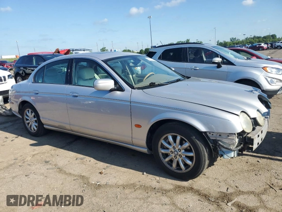2002 Jaguar S-Type with VIN SAJDA01P52GM27504, listed as a Copart auction lot 57850944 with 119,707 mi miles and Clean Title. Bid and sale history available at DreamBid. Image 4.