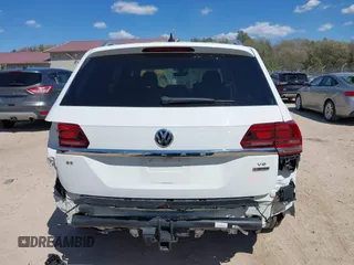 2018 Volkswagen Atlas SE with VIN 1V2KR2CAXJC586848, listed as a IAAI auction lot 42200959 with 96,336 mi miles and . Bid and sale history available at DreamBid. Image 17.