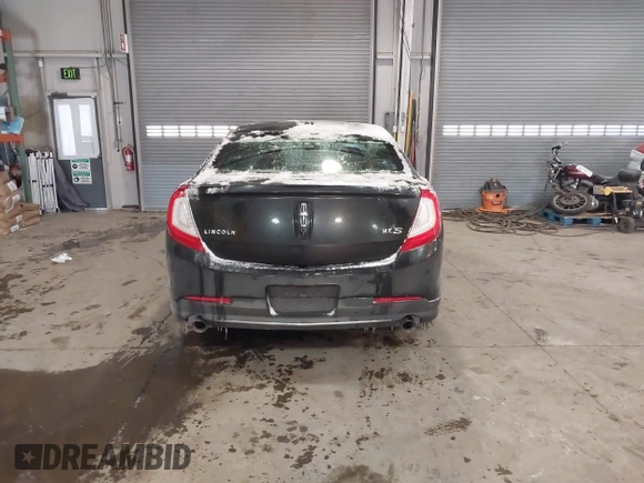 2014 Lincoln MKS with VIN 1LNHL9DK8EG609955, listed as a IAAI auction lot 41580770 with 109,864 mi miles. Bid and sale history available at carsss.com. Image 16.