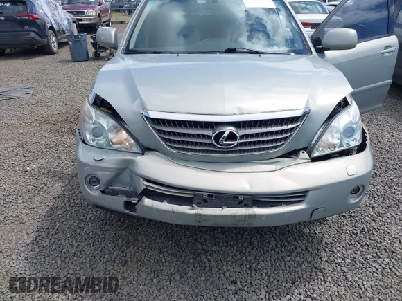 2006 Lexus RX 400h z VIN JTJHW31U860010706, wystawiony jako IAAI lot #42286504 z przebiegiem 220 671 mil mil oraz . Historia ofert i sprzedaży dostępna na DreamBid. Obrazek 6.