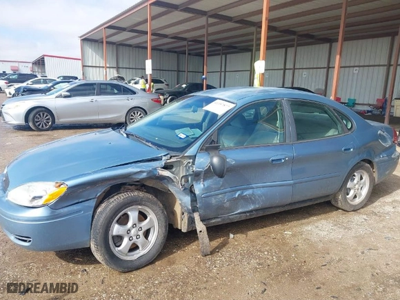 2005 Ford Taurus SE with VIN 1FAFP53U45A176669, listed as a IAAI auction lot 41357877 with 209392 miles. Bid and sale history available at carsss.com. Image 6.