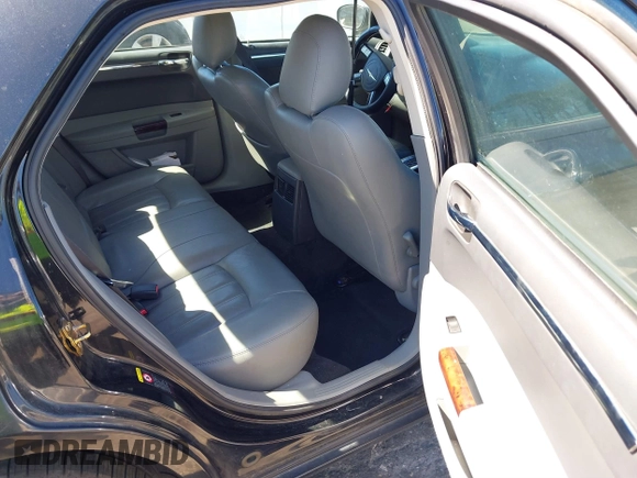 2005 Chrysler 300 with VIN 2C3AA63HX5H649107, listed as a IAAI auction lot 41748562 with 173,803 mi miles. Bid and sale history available at carsss.com. Image 8.