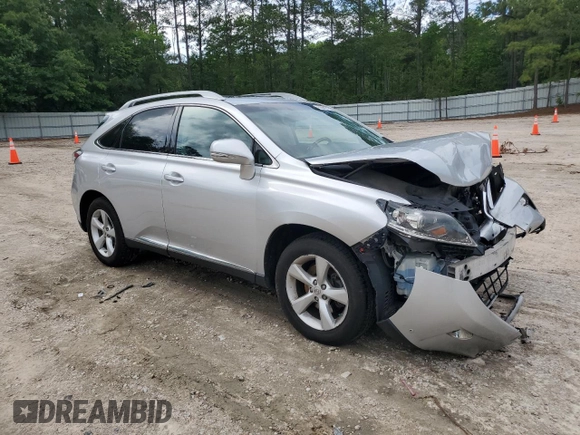 2015 Lexus RX 350 with VIN 2T2BK1BA9FC302248, listed as a Copart auction lot 56641715 with 124,761 mi miles and Salvage title. Bid and sale history available at DreamBid. Image 4.