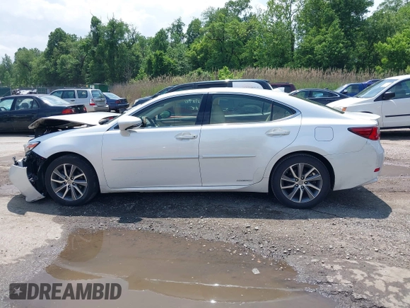 2016 Lexus ES 300h z VIN JTHBW1GG8G2110372, wystawiony jako IAAI lot #42278981 z przebiegiem 140 963 mil mil oraz . Historia ofert i sprzedaży dostępna na DreamBid. Obrazek 14.
