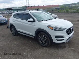 2020 Hyundai Tucson SEL z VIN KM8J3CAL4LU203021, wystawiony jako IAAI lot #42167082 z przebiegiem 49 826 mil mil oraz . Historia ofert i sprzedaży dostępna na DreamBid. Obrazek 1.