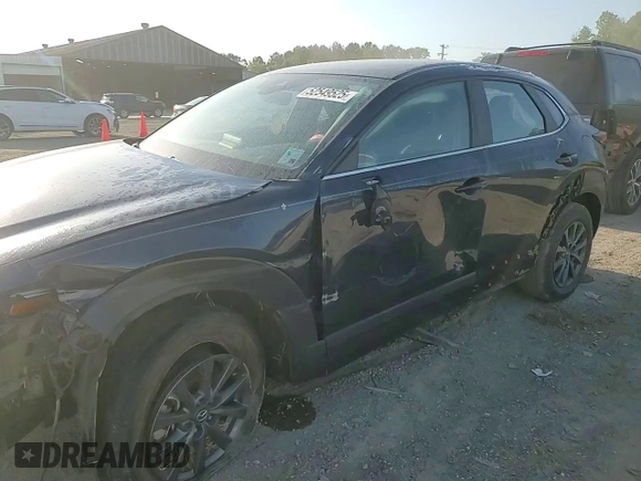 2023 Mazda CX-30 S with VIN 3MVDMBAM1PM566211, listed as a Copart auction lot 52549525 with 36,382 mi miles and Salvage title. Bid and sale history available at DreamBid. Image 12.