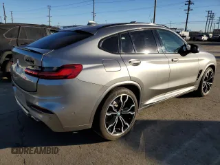 2020 BMW X4 M Competition z VIN 5YMUJ0C02L9C47802, wystawiony jako Copart lot #88896685 z przebiegiem Nie podano mil oraz Szkody całkowita. Historia ofert i sprzedaży dostępna na DreamBid. Obrazek 3.