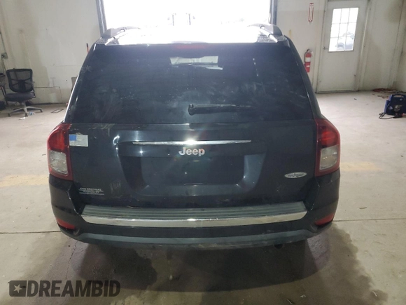 2015 Jeep Compass High Altitude Edition with VIN 1C4NJCEA7FD121910, listed as a Copart auction lot 85274044 with 137,134 mi miles and Salvage Title. Bid and sale history available at carsss.com. Image 6.