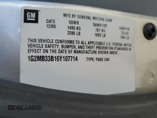 2006 Pontiac Solstice z VIN 1G2MB33B16Y107714, wystawiony jako Copart lot #70491744 z przebiegiem 53 925 mil mil oraz Szkoda całkowita • Salvage title. Historia ofert i sprzedaży dostępna na DreamBid. Obrazek 12.