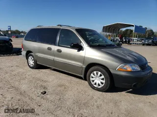 2001 Ford Windstar Wagon LX with VIN 2FMZA514X1BA22070, listed as a Copart auction lot 74446984 with 152,905 mi miles and Salvage Title. Bid and sale history available at carsss.com. Image 4.