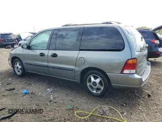 2003 Ford Windstar LX with VIN 2FMZA51413BB77562, listed as a Copart auction lot 56861095 with 170,562 mi miles and Salvage title. Bid and sale history available at DreamBid. Image 2.