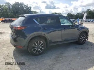 2018 Mazda CX-5 Grand Touring with VIN JM3KFBDMXJ0350499, listed as a Copart auction lot 63475745 with 119,642 mi miles and Salvage title. Bid and sale history available at DreamBid. Image 3.