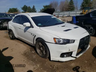 2015 Mitsubishi Lancer Evolution GSR z VIN JA32W8FV3FU022955, wystawiony jako Copart lot #50692924 z przebiegiem 88 882 mil mil oraz . Historia ofert i sprzedaży dostępna na DreamBid. Obrazek 4.