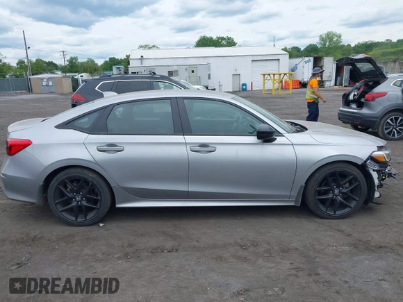2023 Honda Civic Sport with VIN 2HGFE2F55PH501595, listed as a IAAI auction lot 42355942 with 8,924 mi miles and . Bid and sale history available at DreamBid. Image 13.