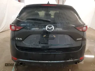 2021 Mazda CX-5 Sport with VIN JM3KFABM4M0334722, listed as a Copart auction lot 44021125 with 64,590 mi miles and Clean Title. Bid and sale history available at carsss.com. Image 6.