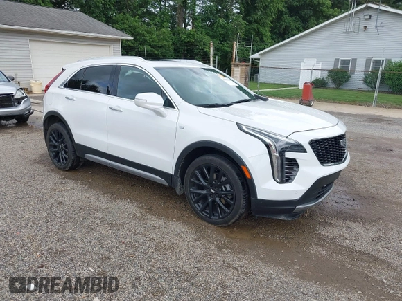 2022 Cadillac XT4 AWD Premium Luxury z VIN 1GYFZDR42NF128199, wystawiony jako IAAI lot #42522314 z przebiegiem 29 002 mil mil oraz . Historia ofert i sprzedaży dostępna na DreamBid. Obrazek 1.