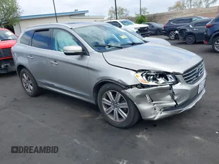 2016 Volvo XC60 T6 Drive-E z VIN YV449MDK3G2857211, wystawiony jako IAAI lot #42130635 z przebiegiem 80 301 mil mil oraz . Historia ofert i sprzedaży dostępna na DreamBid. Obrazek 1.