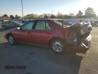1998 Cadillac Seville SLS z VIN 1G6KS54Y1WU933605, wystawiony jako Copart lot #74598874 z przebiegiem 220 398 mil mil oraz Szkoda całkowita • Salvage title. Historia ofert i sprzedaży dostępna na DreamBid. Obrazek 2.
