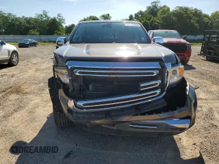 2017 GMC Canyon 2WD SLT z VIN 1GTG5DEN2H1148667, wystawiony jako Copart lot #54824735 z przebiegiem 36 861 mil mil oraz Szkody całkowita. Historia ofert i sprzedaży dostępna na DreamBid. Obrazek 5.