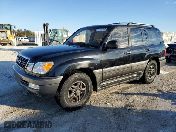 2000 Lexus LX 470 z VIN JT6HT00W3Y0090164, wystawiony jako Copart lot #41338515 z przebiegiem 209 338 mil mil oraz Szkoda całkowita • Salvage title. Historia ofert i sprzedaży dostępna na DreamBid. Obrazek 1.