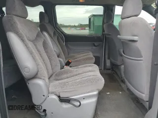 1999 Plymouth Voyager Grand SE z VIN 1P4GP44G7XB831207, wystawiony jako Copart lot #79558714 z przebiegiem 163 620 mil mil oraz Szkody całkowita. Historia ofert i sprzedaży dostępna na DreamBid. Obrazek 11.
