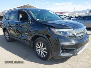 2020 Honda Pilot EX-L with VIN 5FNYF5H54LB009448, listed as a IAAI auction lot 41697106 with 63,310 mi miles. Bid and sale history available at carsss.com. Image 1.