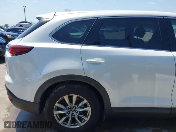 2019 Mazda CX-9 Touring z VIN JM3TCBCY2K0300702, wystawiony jako IAAI lot #42194050 z przebiegiem 98 247 mil mil oraz . Historia ofert i sprzedaży dostępna na DreamBid. Obrazek 18.