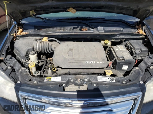 2014 Chrysler Town & Country Touring with VIN 2C4RC1BG3ER441648, listed as a Copart auction lot 50249635 with 174,744 mi miles and Salvage Title. Bid and sale history available at carsss.com. Image 12.