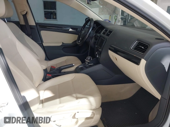 2016 Volkswagen Jetta Sedan 1.8T SEL with VIN 3VWL07AJ5GM310789, listed as a IAAI auction lot 41596429 with 169,910 mi miles. Bid and sale history available at carsss.com. Image 5.