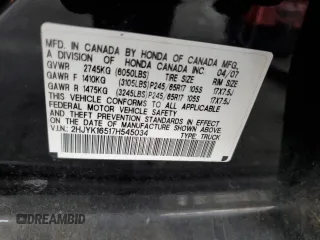 2007 Honda Ridgeline RTL z VIN 2HJYK16517H545034, wystawiony jako Copart lot #59819385 z przebiegiem 258 928 mil mil oraz Czysty tytuł • Clean title. Historia ofert i sprzedaży dostępna na DreamBid. Obrazek 12.
