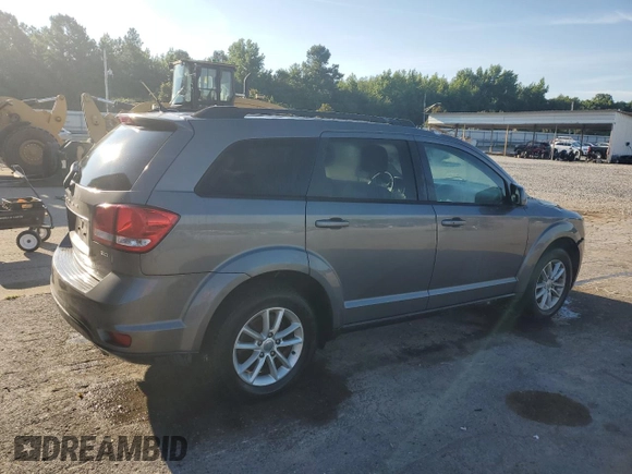 2013 Dodge Journey SXT with VIN 3C4PDCBG0DT522408, listed as a Copart auction lot 62699195 with 130,665 mi miles and Salvage title. Bid and sale history available at DreamBid. Image 3.