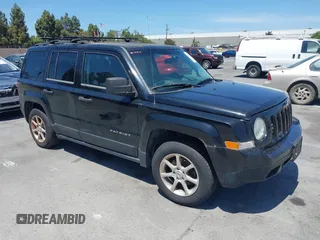 2014 Jeep Patriot Sport with VIN 1C4NJPBBXED511001, listed as a IAAI auction lot 42599195 with 165,473 mi miles and . Bid and sale history available at DreamBid. Image 1.