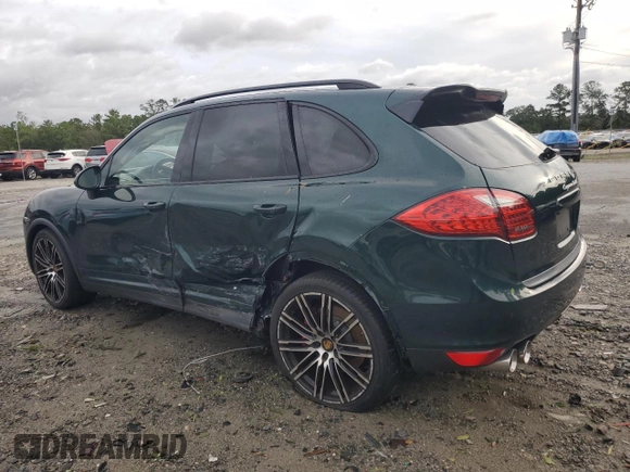 2012 Porsche Cayenne Turbo with VIN WP1AC2A25CLA80579, listed as a Copart auction lot 73360714 with 88,302 mi miles and Salvage title. Bid and sale history available at DreamBid. Image 2.