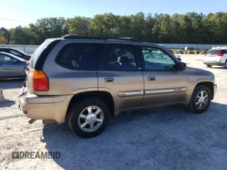2002 GMC Envoy SLT with VIN 1GKDT13S022456264, listed as a Copart auction lot 76556004 with 230,954 mi miles and Salvage Title. Bid and sale history available at DreamBid. Image 3.