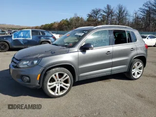 2016 Volkswagen Tiguan SE with VIN WVGBV7AXXGW527304, listed as a Copart auction lot 62690154 with 77,551 mi miles and Salvage Title. Bid and sale history available at DreamBid. Image 1.