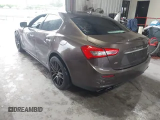 2015 Maserati Ghibli S Q4 z VIN ZAM57RTA3F1146241, wystawiony jako IAAI lot #42251953 z przebiegiem 133 411 mil mil oraz . Historia ofert i sprzedaży dostępna na DreamBid. Obrazek 3.