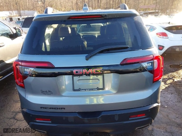 2021 GMC Acadia SLT with VIN 1GKKNMLS6MZ190391, listed as a IAAI auction lot 41353351 with 104,851 mi miles. Bid and sale history available at carsss.com. Image 16.
