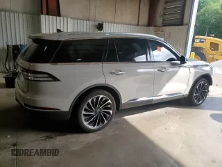 2021 Lincoln Aviator Reserve with VIN 5LM5J7XC9MGL13856, listed as a Copart auction lot 53813935 with 56,816 mi miles and Salvage title. Bid and sale history available at DreamBid. Image 3.