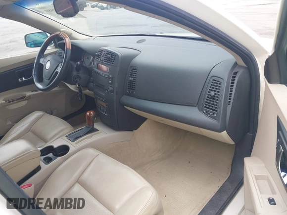 2005 Cadillac CTS z VIN 1G6DP567150191579, wystawiony jako IAAI lot #42399980 z przebiegiem 76 845 mil mil oraz . Historia ofert i sprzedaży dostępna na DreamBid. Obrazek 5.