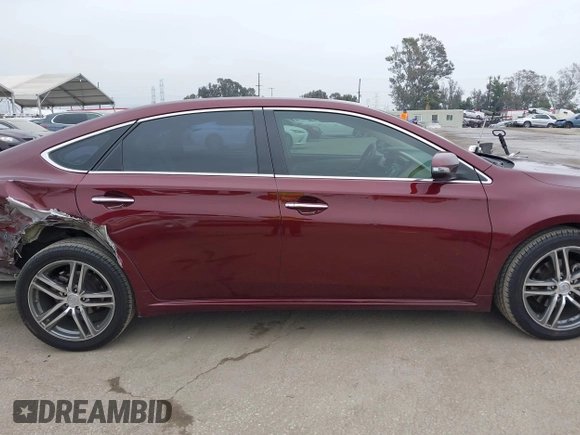 2013 Toyota Avalon XLE with VIN 4T1BK1EB1DU001297, listed as a IAAI auction lot 42041699 with 217,190 mi miles and . Bid and sale history available at DreamBid. Image 13.